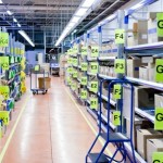 stands with carton boxes in storage warehouse